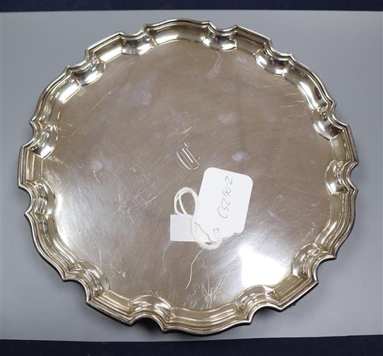 A George V silver salver with piecrust border, Birmingham, 1934, 15 oz.